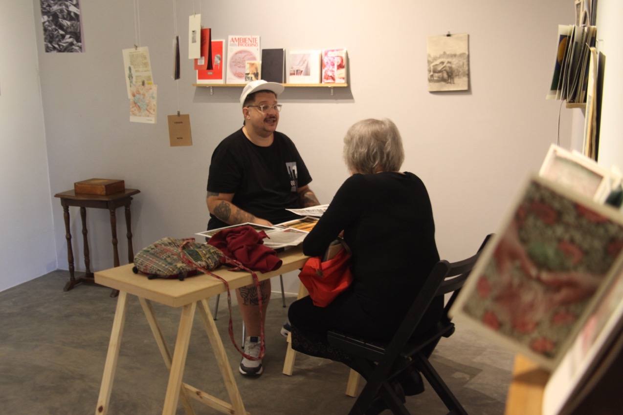 Leitura de portfólio durante a II Feira Mamona
